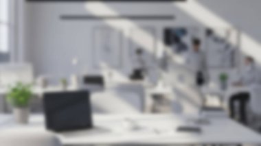 Parlak, modern bir ofis. Güneş ışığıyla yıkanmış..