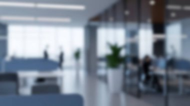 Doğal ışık ve ince insan varlığı ile bulanık bir modern ofis, üretken ve işbirlikçi bir iş ortamı ortaya koyuyor.