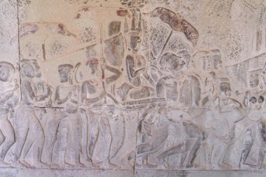 Siem Reap, Kamboçya 'daki Angkor Wat' ta Kral 2. Suryavarman 'ın askeri geçit törenini tasvir eden, Khmer işçiliği ve tarihsel askeri ikonografi sergilenen karmaşık bas-yardım gösterisi..