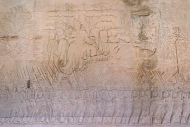 Siem Reap, Kamboçya 'daki Angkor Wat' ta Kral 2. Suryavarman 'ın askeri geçit törenini tasvir eden, Khmer işçiliği ve tarihsel askeri ikonografi sergilenen karmaşık bas-yardım gösterisi..