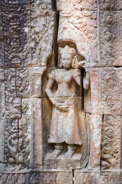 Ta Som Tapınağı, Siem Reap, Kamboçya 'daki Angkor döneminden kalma bir Budist tapınağı, devasa ağaç kökleri ile sarmalanmış özel taş geçidiyle tanınıyor..