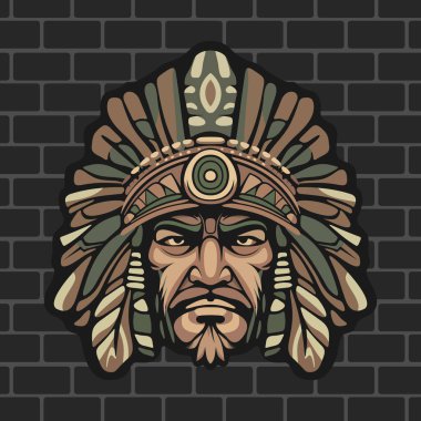Sert yüzlü, stilize yapraklarla çevrili kabile maskeli savaşçı kızılderili. Tuğla duvarın arka planında süslü etnik detaylar var.