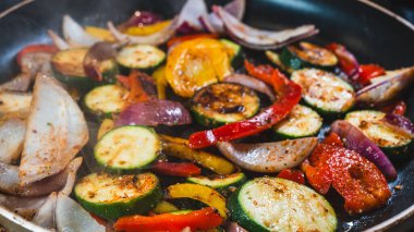 vegetables and spices in a pan