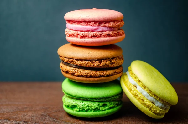 Colorful macarons cakes. Small French cakes. Sweet and colorful french macaroons.