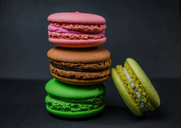 Colorful macarons cakes. Small French cakes. Sweet and colorful french macaroons.