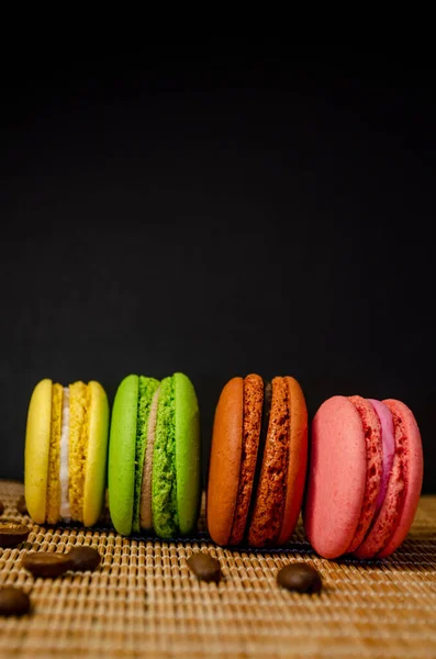 Colorful macarons cakes. Small French cakes. Sweet and colorful french macaroons.