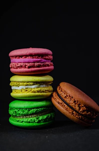 Colorful macarons cakes. Small French cakes. Sweet and colorful french macaroons.