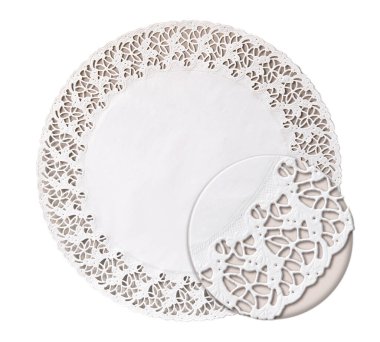 Büyüteç altında dekoratif desenli kağıt şekerleme peçetesi. Beyaz arkaplanda izole edilmiş hassas peçete