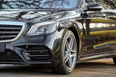 Modern car close view background,  luxury city car wallpaper