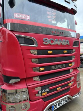 red truck scania  on a road