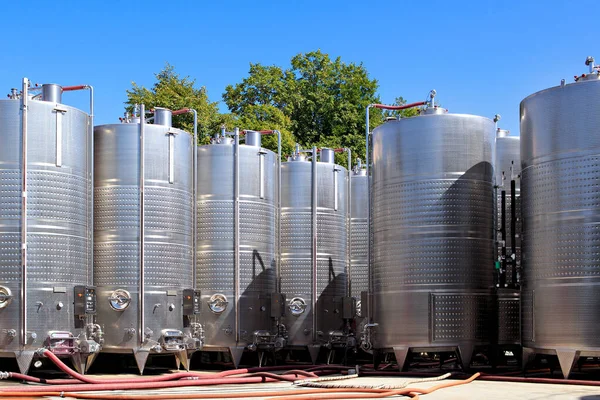 Steel wine tanks. Wine production. Winemaking