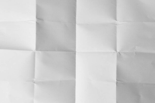 white folded paper textured background