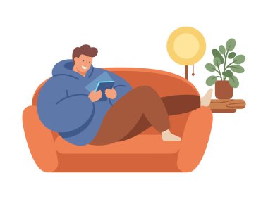 adam tablet ile kanepede rahatlatıcı.