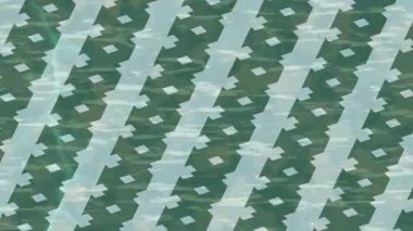 Benzersiz hareket grafikleri tasarım sanatına sahip yaratıcı film üretimi için özet bir arkaplan