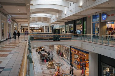 Cottonwood Mall in New Mexico with almost no shoppers and showing the stores Build-A-Bear Workshop, Factory Edge, Dillard's, FYE, and Charlotte Russe in Albuquerque, NM, USA