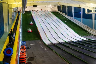 Indoor snow tubing slides inside Pigeon Forge Snow in Pigeon Forge, Tennessee, USA