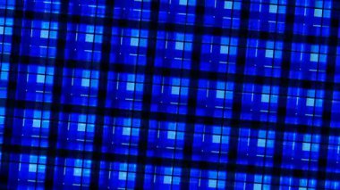 Dinamik ışık ve gölge efektleriyle mavi ızgara desenli büyüleyici soyut bir arka plan, geleceksel ve teknolojik bir ortam yaratıyor..