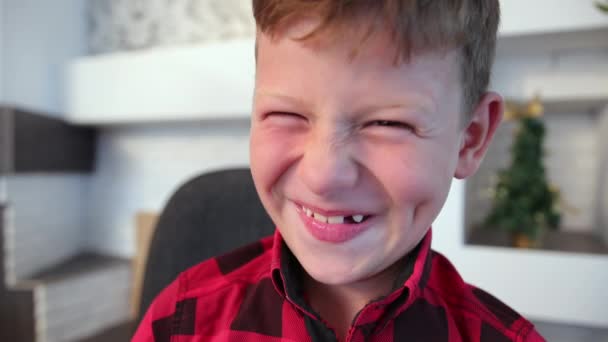 Crazy boy grimacing at camera. Studio shot. lad grimaces in front camera. Guy — Stock Video