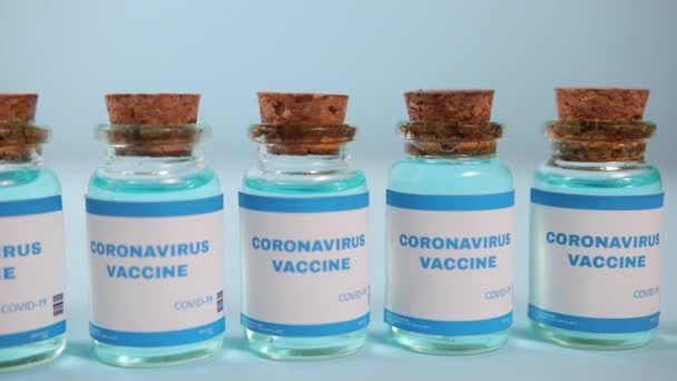 NCoV elleni ampulla vakcina. Coronavirus vakcinázás, covid-19 influenza prevenció — Stock videók