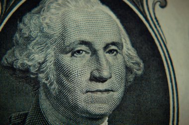 George Washington 'ın bir dolarlık banknottaki fotoğrafı. Kapatın.