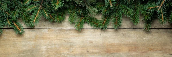 Houten Achtergrond Met Kerstboomtakken Sneeuw Kerstconcept Een Spandoek Vlakke Lay — Stockfoto