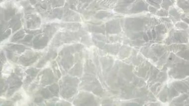 Kumlu tabanlı deniz dalgası dokusu.