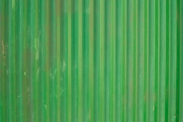 green metal wall. Texture can be used for the background of the text or any content.