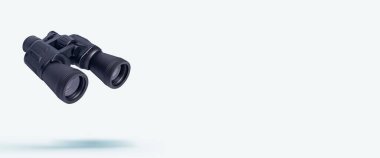 Işık arka planında uçan dürbünler. Dürbünler uçuyor. Havalanma. Pankart.