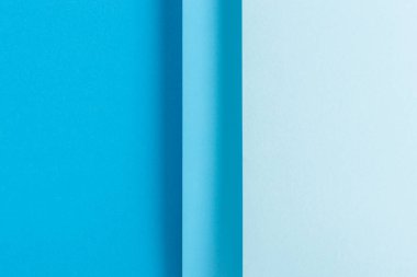 Renkli mavi katlanmış kağıt malzeme tasarımı. Üst manzara, düz uzanma.