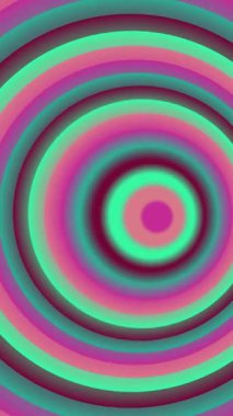 Pembe yeşil ve mor tonlarda eş merkezli dairelerin büyüleyici bir videosu.