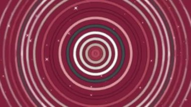 Seamless motion background featuring expanding concentric circles in shades of pink and red with shimmering white sparkles. Hypnotic retro-style target animation loop.