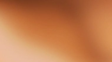 Yaratıcı tasarım projeleri ve arka planlar için hafif ışık varyasyonları ve soyut bulanık dokusu olan yumuşak turuncu gradyan