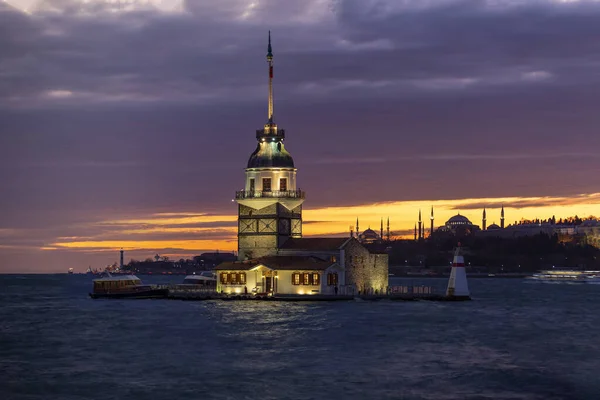 Maiden tower (Kiz kulesi), on a small island in the Bosphorus. Night landscape of Istanbul, Turkey.