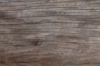 Küçük yatay çatlakları olan ahşap doku.