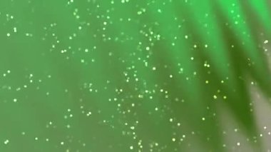 Soyut Dönen Parçacıklar, Parıldayan Yeşil Soyut Arkaplan Bokeh Efekti ve Palmiye Yaprağı Silüeti Hareketi, telif hakkı olmayan hisse senedi.