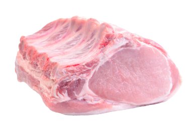 Taze çiğ domuz pirzolası, sebzeli ve baharatlı biftek.