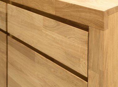 Wooden drawers close view photo, wooden eco furniture elements background. Solid wood furniture details