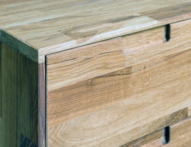 Drawers close view photo, wooden furniture background
