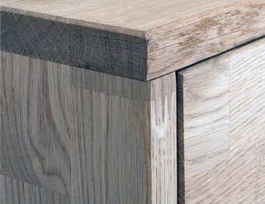 Drawers close view photo, wooden furniture elements background. Furniture details