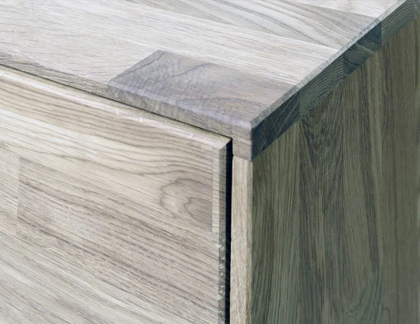 Wooden drawer close view photo, wooden eco furniture elements background. Solid wood furniture details