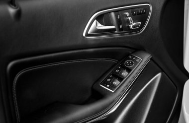 Modern city car black leather door,  inside luxury city car photo