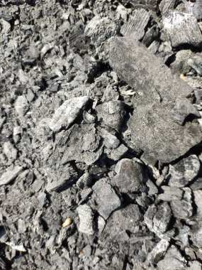 Kömür desenli yakın görüş arkaplanı. Kömür parçaları doku makro görünümü