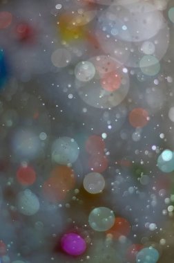 Soyut ışıltılı arka plan deseni, kutlama duvar kağıdı, sunum kapağı. Canlı renkler, şenlikli duvar kâğıdı çizimi