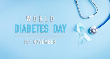 Dünya Diyabet Günü Farkındalık Konsepti, Pastel arka planda mavi kurdeleli steteskop, 14 Kasım.