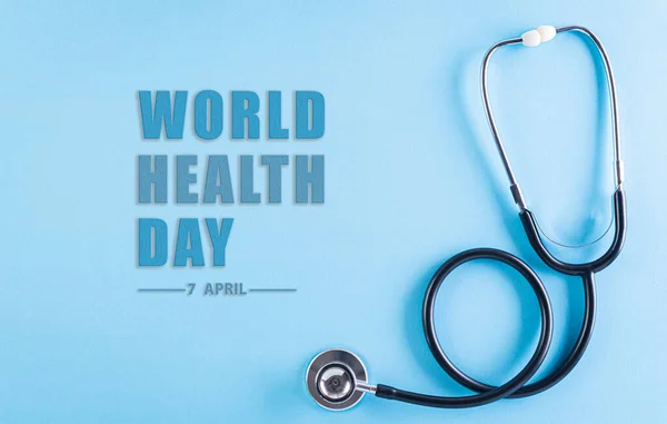World health day, Healthcare and medical concept. Stethoscope on pastel blue background with the text.