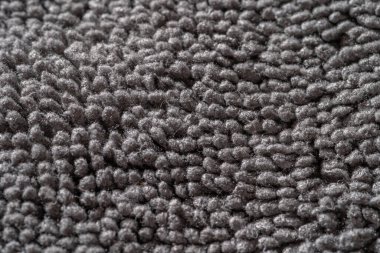 Mikrofiber gri kumaş kumaş dokusu yüzeyi, makro fotoğraf.