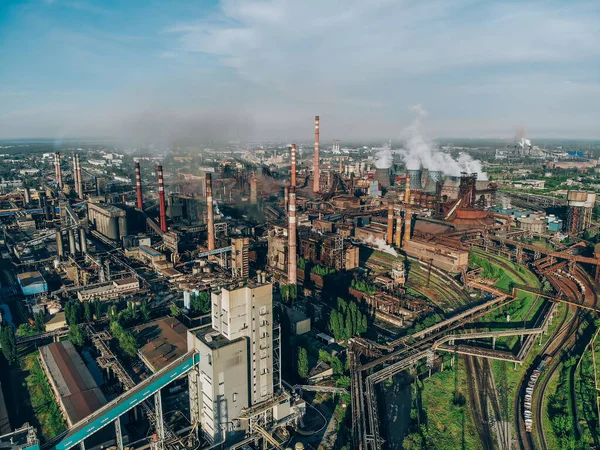 Industry metallurgical plant or chemical factory with coal, pipes, blast furnaces and many smog pollution, aerial view — Stockfoto