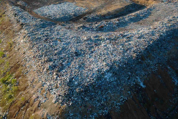 Waste disposal site or landfill with plastic and other inorganic waste harmful to nature, aerial view