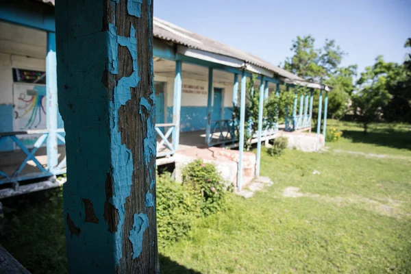 The old school building which is now completely dilapidated and destroyed. Now there is no school and no one comes here.