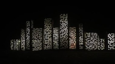 Çizgi film tarzı şehir binaları. Gerçekçi şehir ışıklarla minyatürler inşa ediyor. Geçmişi. Dekoratif şehir. Seçici odak